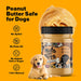 Peanut butter that is safe for dogs. A relaxed golden retriever is pictured on an orange background, featuring the poochbutter.