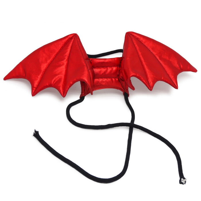 Red devil wings with a black headband on a white background
