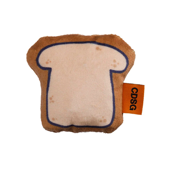 Toy shaped like a slice of bread with a 'CDSG' tag on a white background