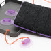 Cat bed with purple suction cups on a white background