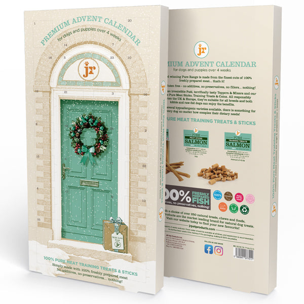 A boxed product package shown from the front and back on a plain white background. The front features a teal holiday door with a wreath and the text 'PREMIUM ADVENT CALENDAR' and '100% PURE MEAT TRAINING TREATS & STICKS.