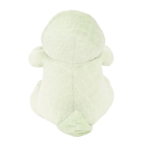 Green plush toy t-rex design on a white background