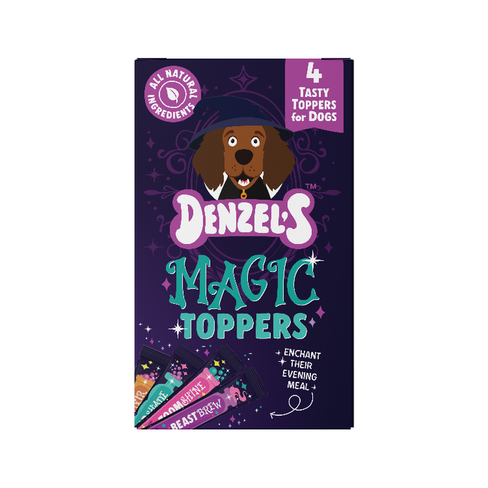 A box of Denzel's Magic Toppers for dogs, featuring a dark purple background with a cartoon dog wearing a wizard hat. The box includes a pink circular badge that says 'All Natural Ingredients' and a pink banner that says '4 Tasty Toppers for Dogs'.