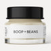 Jar of 'Boop + Beans' cream with a black lid on a white background