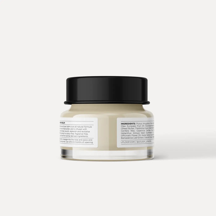 Jar of cream with a black lid on a white background