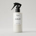 Lfloof Scruff detangle spray bottle on a light gray background