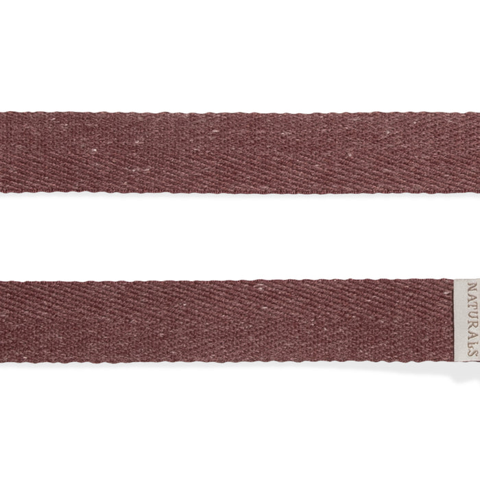 Close-up of a brown woven lead with a visible brand label on a white background