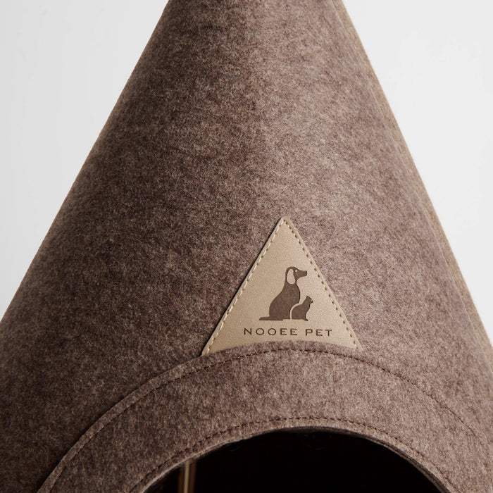 Brown pet cone-shaped house with Noggee Pet logo on a light gray background