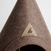 Brown pet cone-shaped house with Noggee Pet logo on a light gray background