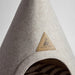 Beige pet bed with a triangle logo on a white background
