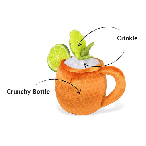 An orange textured mug with a handle, filled with white foam and topped with a green leaf garnish and a lime slice. Curved arrows label the mug as 'Crunchy Bottle' and the foam as 'Crinkle'.