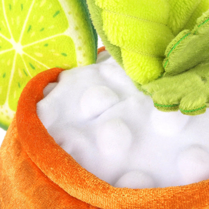Green plush toy with a textured surface on a white background