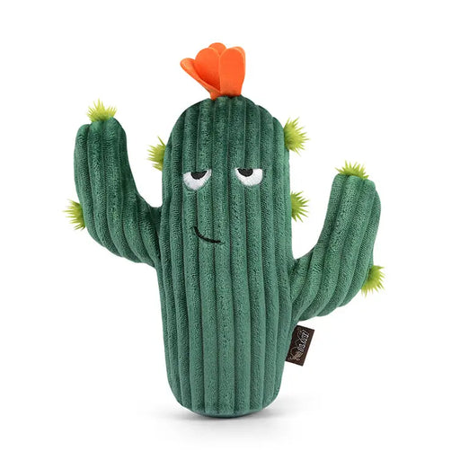 A green plush cactus toy with a smiling face, small spiky details, and an orange flower on top, photographed on a clean white background.