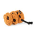 A plush dog toy shaped like three overlapping chocolate chip cookies in a warm tan-brown color, with dark brown chip details and a black rope tail, photographed on a clean white background.