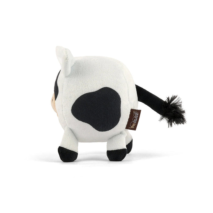 A small plush cow toy shown from the back on a clean white background. The toy is primarily white with a large black patch on its back, black hooves, and a black tail with a fluffy black tip.
