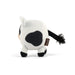 A small plush cow toy shown from the back on a clean white background. The toy is primarily white with a large black patch on its back, black hooves, and a black tail with a fluffy black tip.
