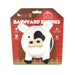 Plush cow toy in packaging with 'Barnyard Buddies' branding on a white background