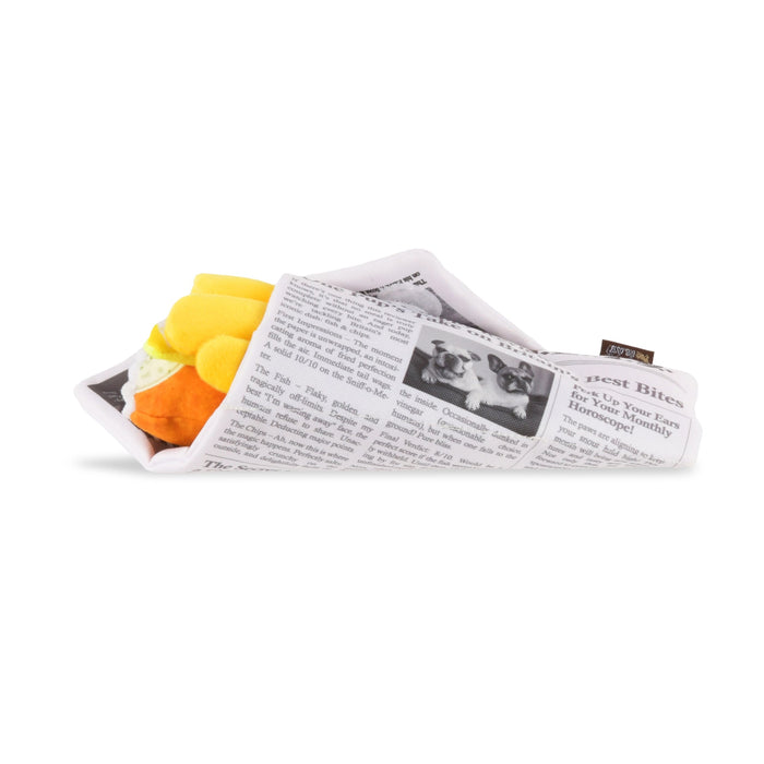 Newspaper folded into a compact shape with colorful flowers on a white background