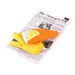 Dog toy shaped like a fish with a lemon on top, placed on a newspaper background.