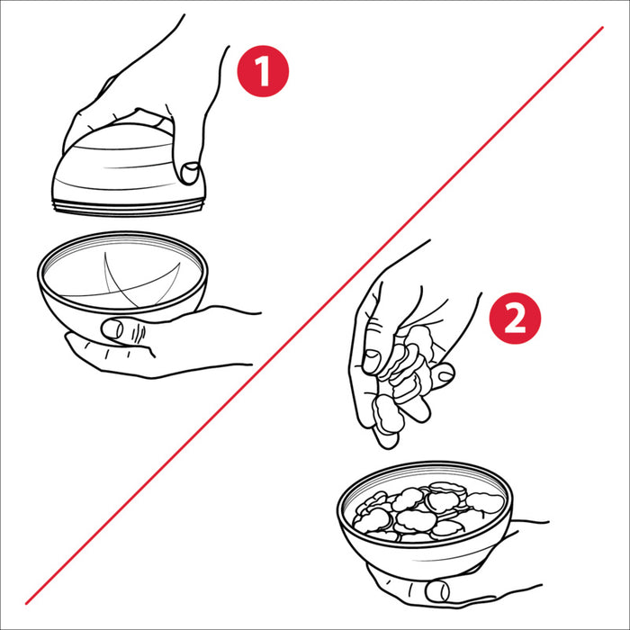 Instruction diagram showing two numbered steps with hand illustrations: step 1 shows a hand lifting a striped lid above a bowl, and step 2 shows a hand placing small round items into the bowl. A red diagonal line crosses the two steps.