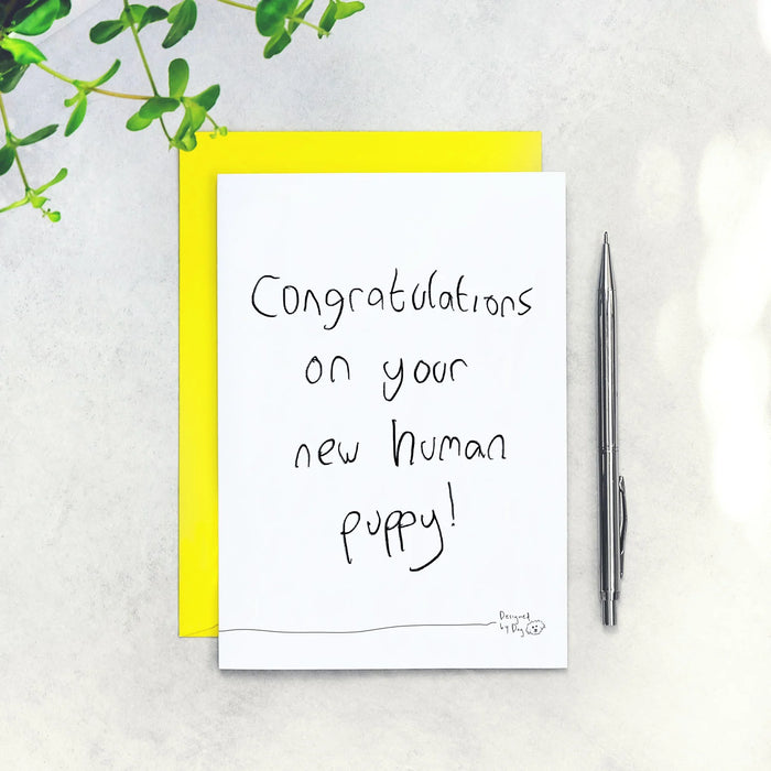 Paper Plane Congratulations on Your New Human Puppy - Funny Card Designed by Dog