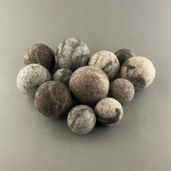 wool balls on a grey backround