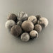 wool balls on a grey backround