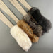 fur rope toys on a gray background