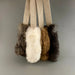 fur rope toys on a gray background