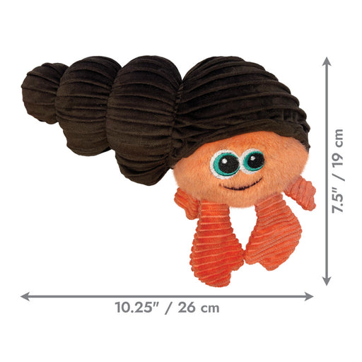 A small plush toy with a dark brown coiled hair-like shape on top, a peach face and body, and orange striped tentacles, shown on a white background with measurement arrows and labels indicating 10.25 inches wide by 7.
