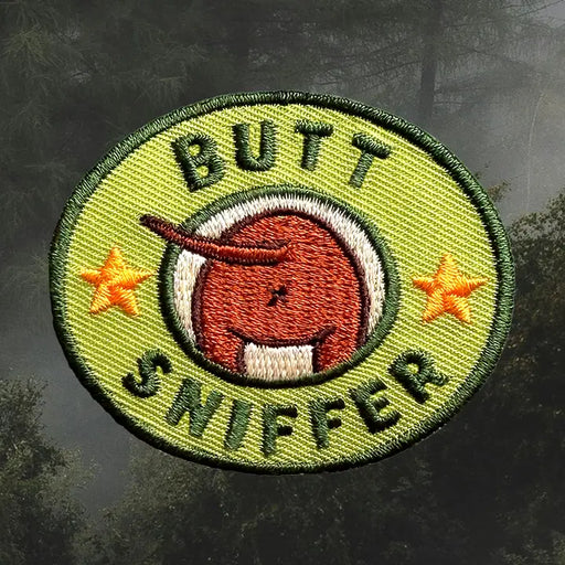 patch that reads 'BUTT SNIFFER'