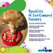 Dog eating from a red enrichment feeder with text listing benefits on a colorful background
