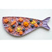 Fish-shaped plate with food on a white background