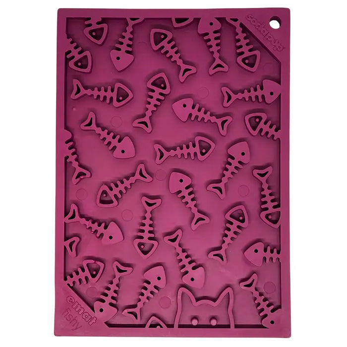 A mauve silicone mould for making fish-shaped items, featuring a repeating pattern of fish skeleton shapes and a cat face cutout at the bottom, shown on a plain white background.