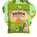 A package of Soopa Healthy Bites dog treats, Kale & Apple flavor, featuring a green and beige bag with a picture of a dog and illustrations of kale and apple, set against a light green background with whole kale and apple graphics.