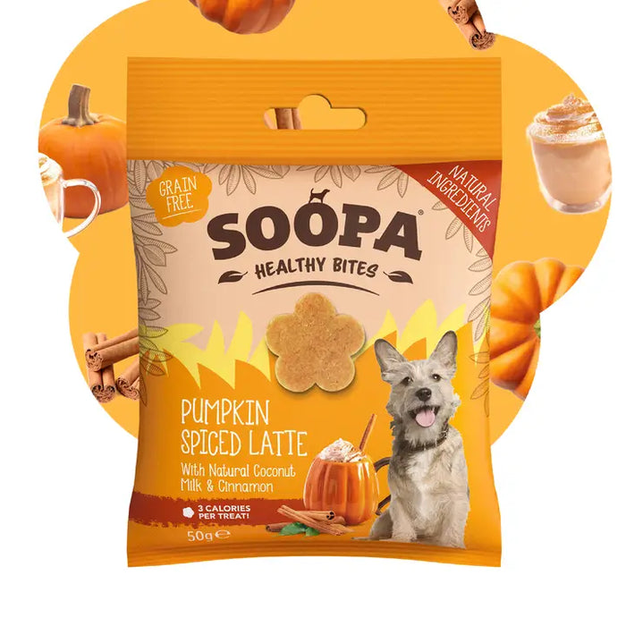 A package of Soopa Healthy Bites dog treats in Pumpkin Spiced Latte flavor, featuring a cartoon dog and pumpkin illustrations on the front, set against a warm orange and yellow background with decorative pumpkin and coffee cup graphics.