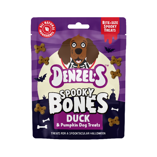 A package of Denzel's Spooky Bones Duck & Pumpkin Dog Treats in a purple Halloween-themed bag with a cartoon dog face and treat illustrations.