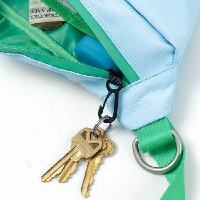 blue and green bag with keys