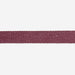 Close-up of a burgundy ribbon on a white background