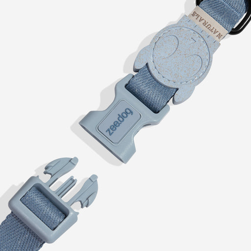 Blue pet collar with a visible brand logo on a white background