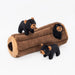 Dog toy with plush bear figures and a brown log on a white background