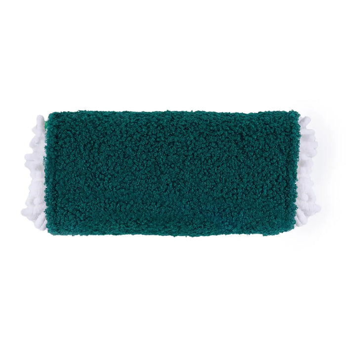 A rectangular dark green plush mat with white terry cloth edges, shown flat against a white background.