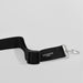 Black dog collar with 'CocoPup London' branding on a light grey background