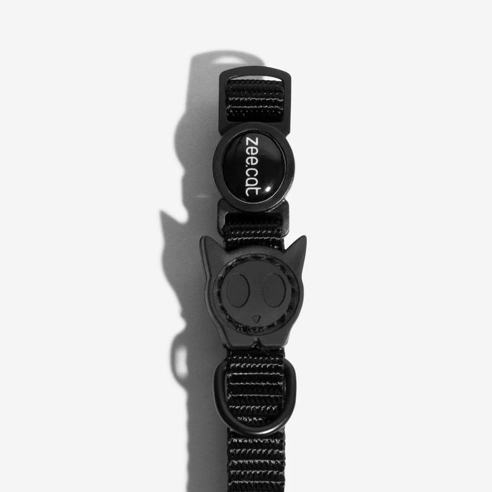 Black pet collar with 'zeecat' branding on a white background