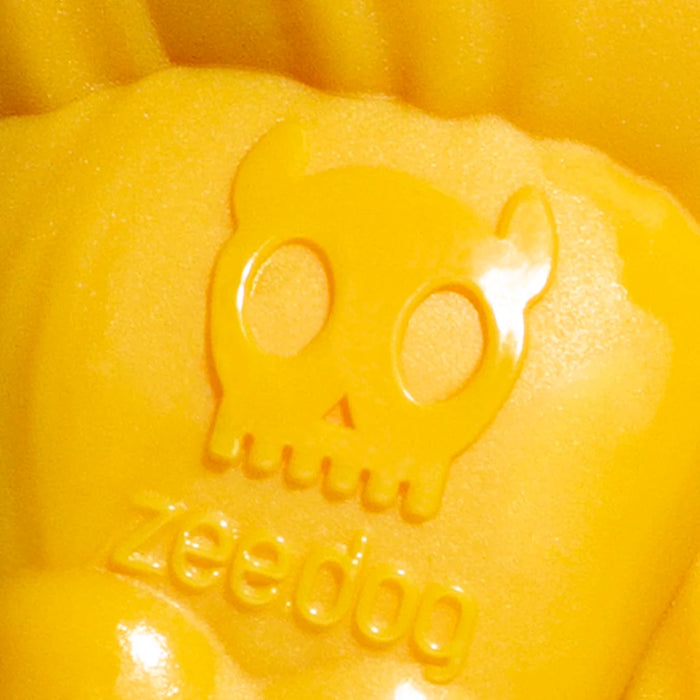 Yellow dog toy with a skull and zeedog text