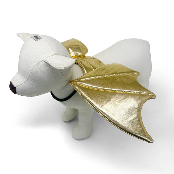 White plush toy with gold wings on a white background