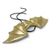 Gold bat-shaped earrings on a white background