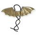 Gold dragon wing headband on a white background