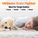 Young boy lying on a carpet with a puppy, featuring text about stain fighter for various stains.