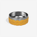 Stainless steel bowl with yellow silicone rim on a white background